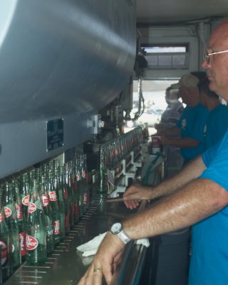 Bottle filling and capping line
