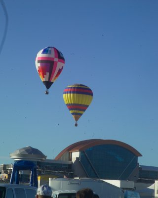 The lower balloon came within 50 ft of the buildings roof