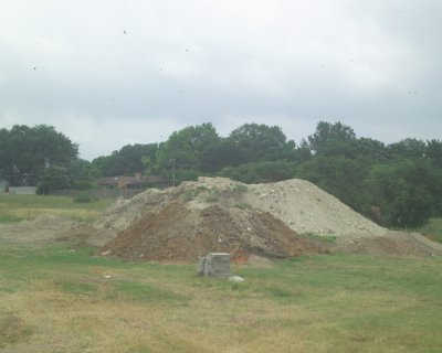 The Dallas Parks Dept remodels a sports field and dumps fill on wildgrass wildflower field