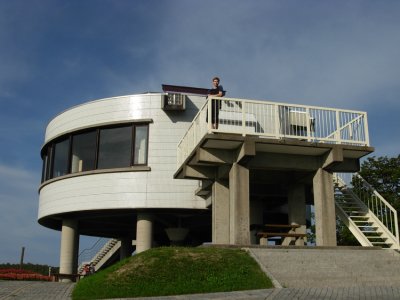 Lookout structure on top of hill.