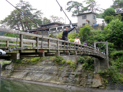 There's a Buddhist shrine along the river bank.