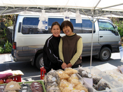 Mom and daughter-in-law working a fruit stand at the top of today's long climb. Very tasty fruit.