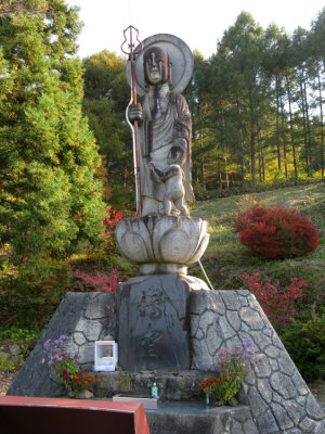 Buddhist Statue at the top of our second long climb.