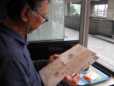 Geno in Matsumoto at McDonald's studying the city map. Hey, there's free coffee refills.