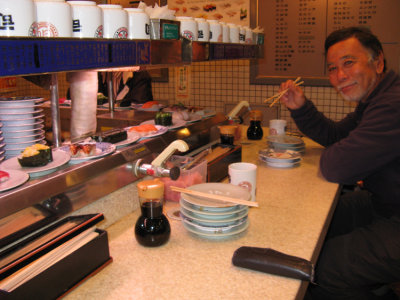 Sashimi lunch. Select your dish as they rotate around the counter. Speaking is not required.