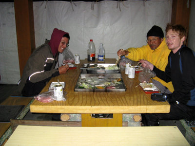 Dinner outside during a cold windy night.