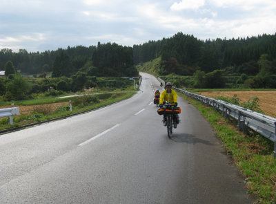 The smile on Jay's face saids it all. The Road is still wet from overnight rain.