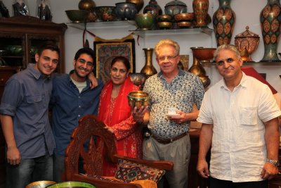 Craftland owner, his family, and customer
