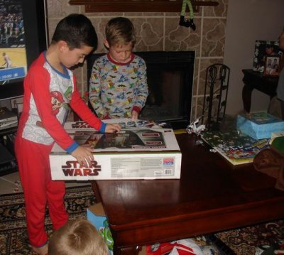 Ty and Reilly opening gifts