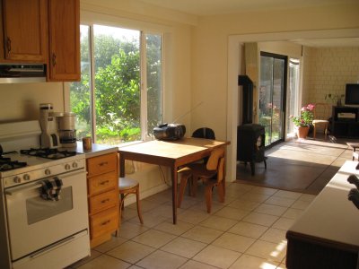 sunrise through kitchen and living room windows