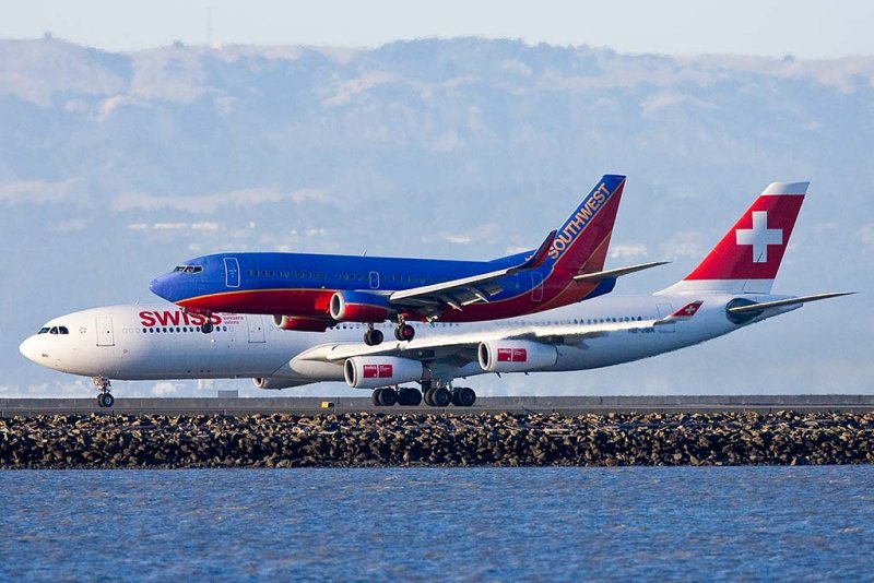 6/12/2010  Southwest Boeing 737 landing while Swiss Air Airbus A340 taking off