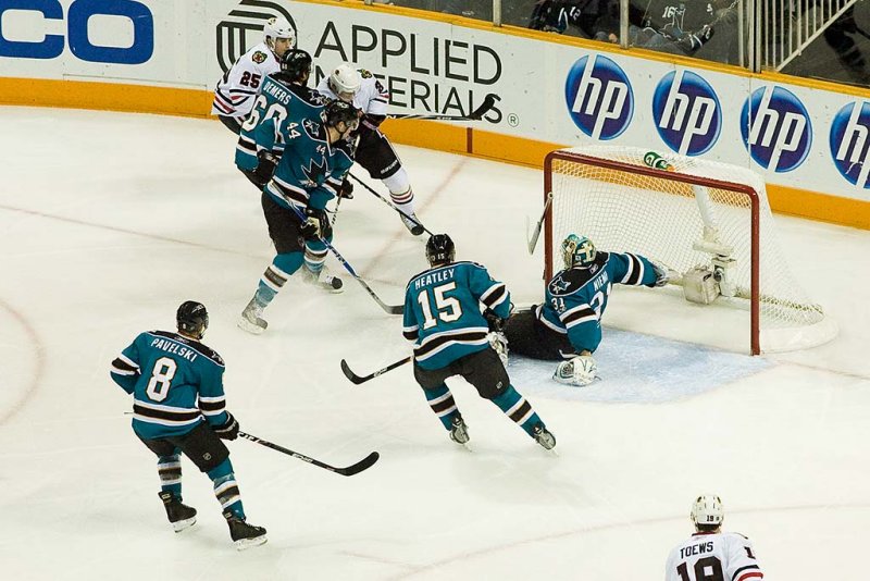 Antti Niemi falls and loses his stick