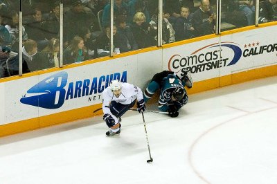 Jamie McGinn misses a check on Jordan Eberle