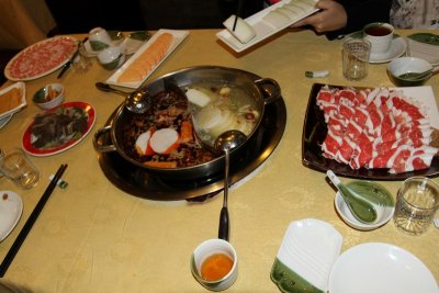 Hot pot, with  dish of tripe on left