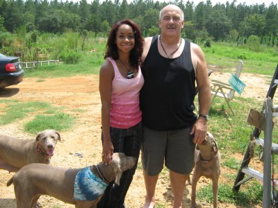 here's marv and an Atlanta Falcon cheerleader the day she came to put deposit on puppy