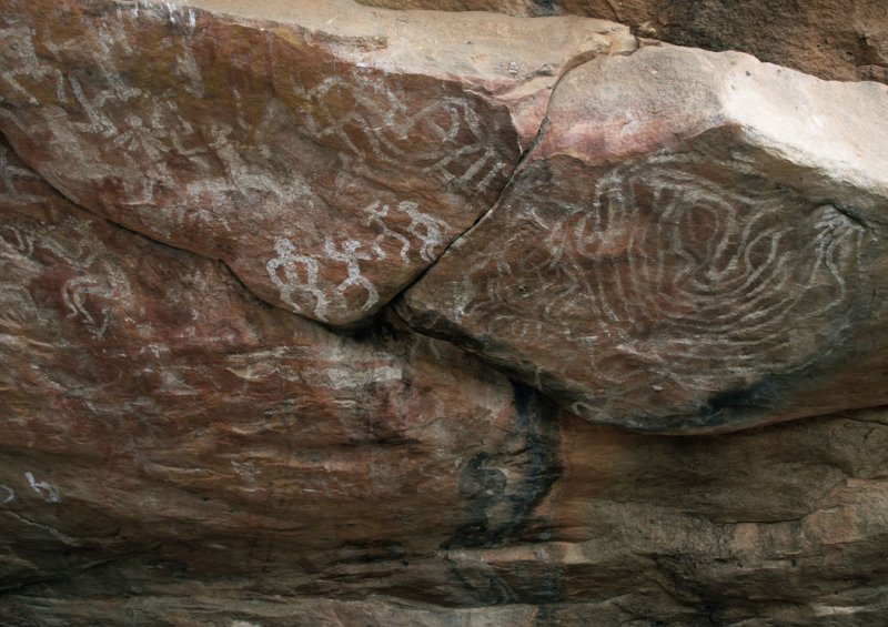 Figures and patterns, white on red