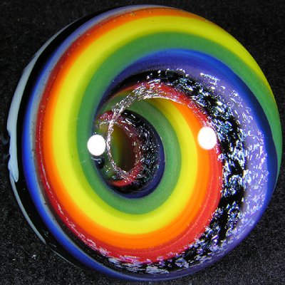 It's hard to imagine a brighter rainbow in a marble, and you'll get the pot of gold if you buy this one!