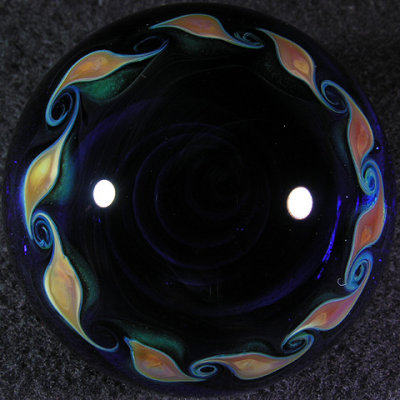 Check it - with a bright light, you can see through the cobalt blue to the twists of the vortex inside, reverse view.