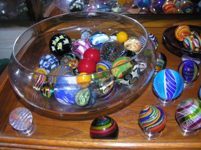 Shelf #7 - Assorted bowls and swirls (Wheaton bowls on left and right)