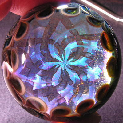 Awesome with backlighting, or holding it up to the light - you can see the pattern thru the dichro!