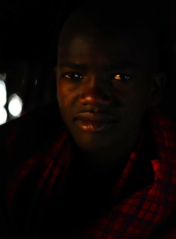 Young English spoken Maasai inside the house.
