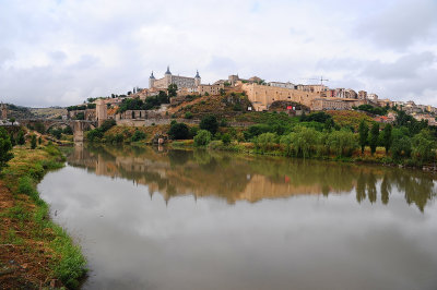 Alcazar fortress around by Tagus river