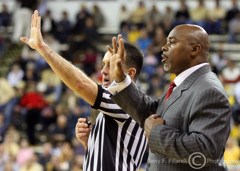 North Carolina State Wolfpack Head Coach Sidney Lowe signals to his team during a pause in the action