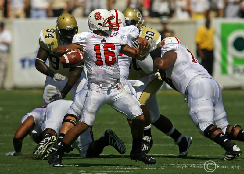 North Carolina State QB Russell Wilson sets up to throw from the pocket