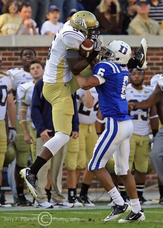 Georgia Tech WR Hill pulls in a pass over Duke CB Cockrell