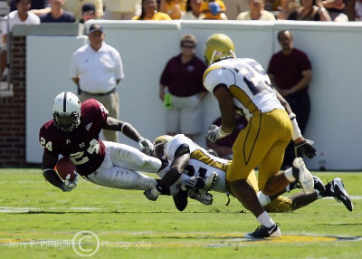 Tech brings down Bulldogs RB Dixon with an open field tackle