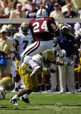 Jackets CB Rasheed Reid is hurdled by Mississippi St. RB Dixon