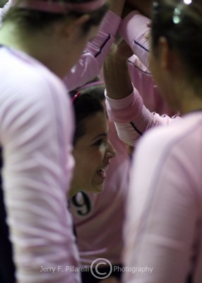 Jackets L Michelle Kandell addresses the team in the pregame huddle