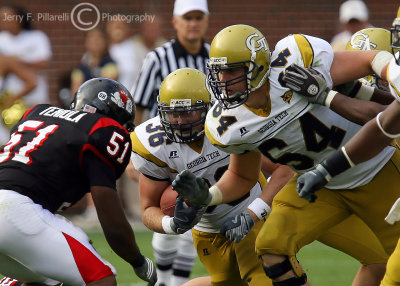 Jackets OT Andrew Gardner takes on Bulldogs LB Oluwadamilola Teniola in an effort to spring RB Cox for a gain