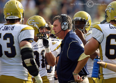 Georgia Tech Head Coach Paul Johnson meets with his offense during a timeout