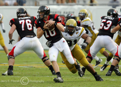 Tech DE Derrick Morgan chases GWU QB Devin Campbell out of the pocket