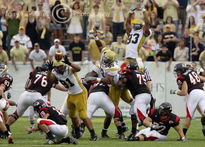 Yellow Jackets DE Derrick Morgan tips a field goal attempt with 9 seconds left in the game to give Tech the win