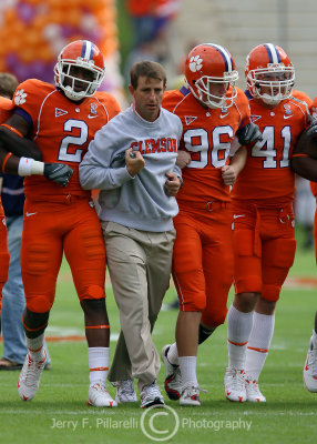 New Clemson Tigers Head Coach Dabo Swinney leads the team in a Tiger Walk to the end zone prior to the game