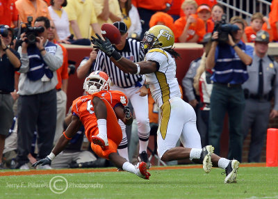 GT S Morgan Burnett keeps his eye on the ball and pulls down the interception over CU WR Jacoby Ford