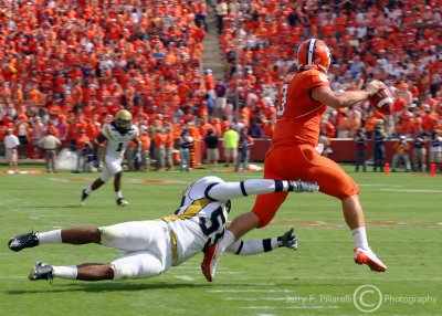 Georgia Tech LB Kyle Jackson dives in an attempt to bring down scrambling Clemson QB Korn