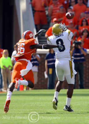 Jackets WR Demaryius Thomas halls in a pass in front of Tigers CB Maxwell