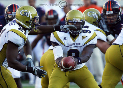 Jackets QB Nesbitt hands off to B-back Dwyer