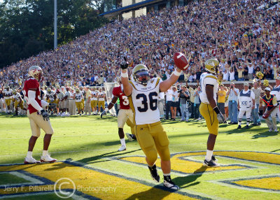 Georgia Tech RB Lucas Cox scores a second quarter touchdown from a yard out to tie the game