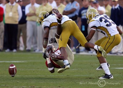 Tech S Burnett separates FSU WR Greg Carr and the ball to deny a third quarter completion