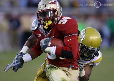 Georgia Tech S Burnett catches Florida St. RB Jermaine Thomas from behind…