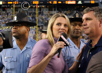 Yellow Jackets Head Coach Paul Johnson is interviewed at midfield by ESPN correspondent Stacey Dales