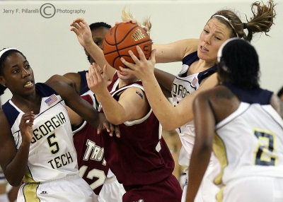 Yellow Jackets F Brigitte Ardossi grabs a rebound in a crowd