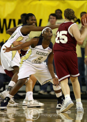Georgia Tech G Bennett gets low to defend against Troy G Morrissy