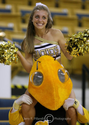Jackets Cheerleader gets a ride from Buzz during a break in the action