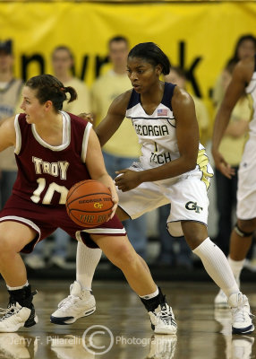 Jackets G Williams defending against Troy G Larelle Roper