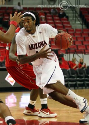 Arizona Wildcats F Hill drives into the lane on the way to the basket